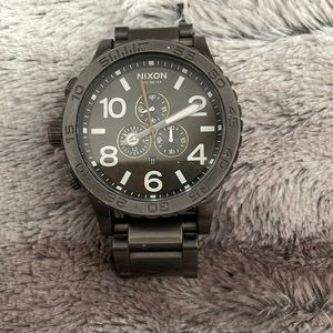 Black Nixon male watch 300 meter